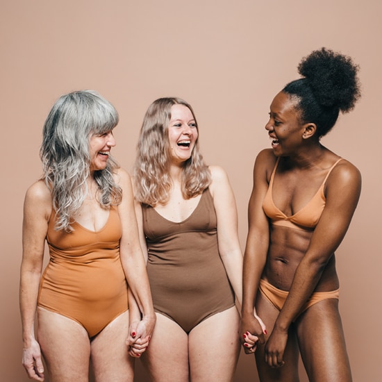 3 women smiling in underwear