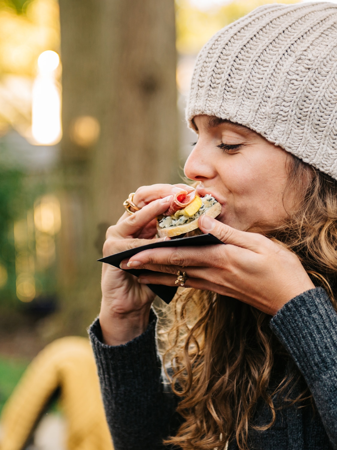 woman eating sandwich