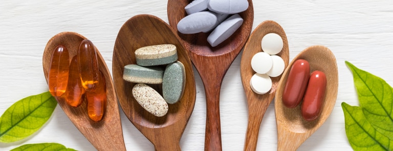 wooden spoons with different supplements