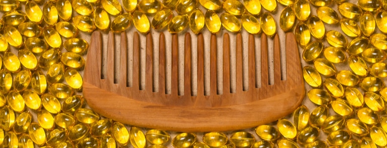 biotin supplements with hair comb