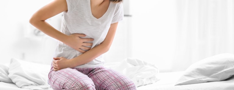 Why do I have stomach cramps after eating? image