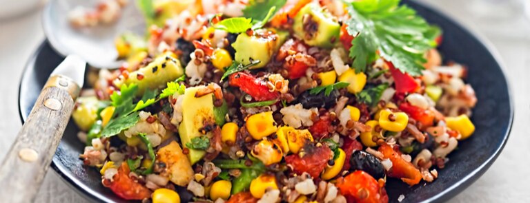 black bean, quinoa and sweetcorn salad with avocado for fibre-rich dinner