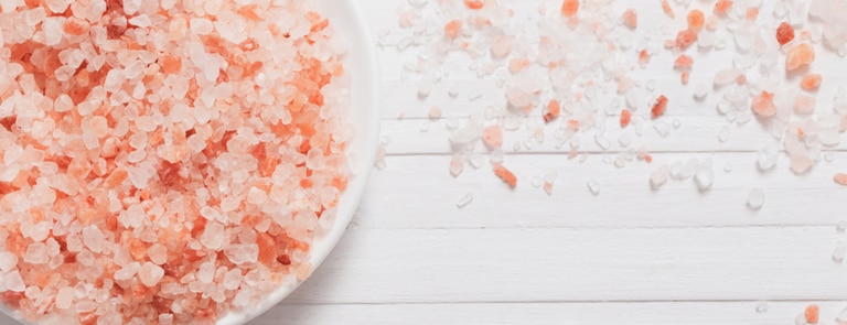 bowl of himalayan pink salt on table