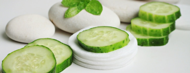 cucumber slices on eye pads