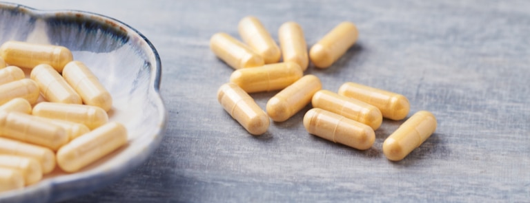 co-enzyme q10 supplements on table