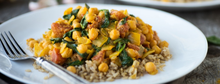 spinach and chickpea dahl on rice for healthy iron-rich meal