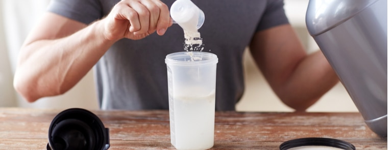 Man making a protein shake for breakfast