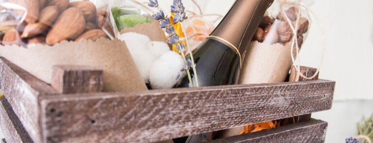 wooden crate with christmas hamper gifts for sustainable gifting method 