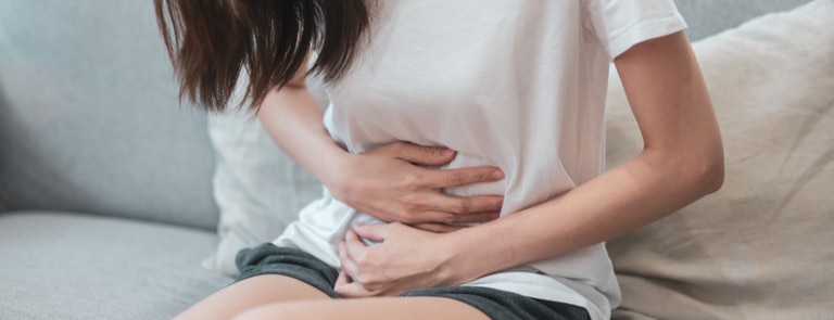 woman with a painful and bloated stomach