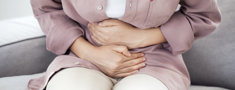 women with stomach pain