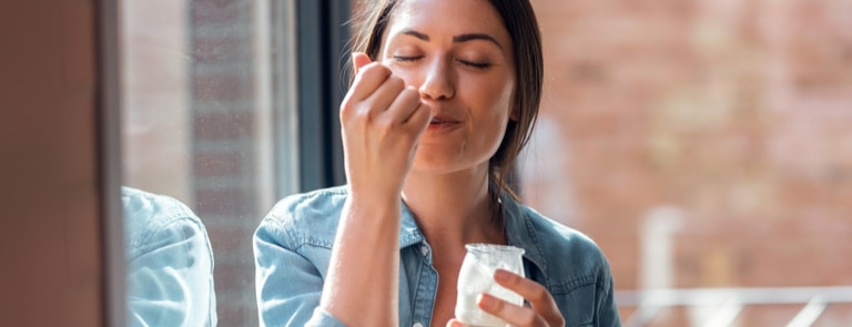 women eating a live yoghurt