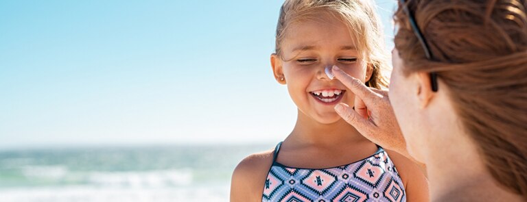 child with suncream