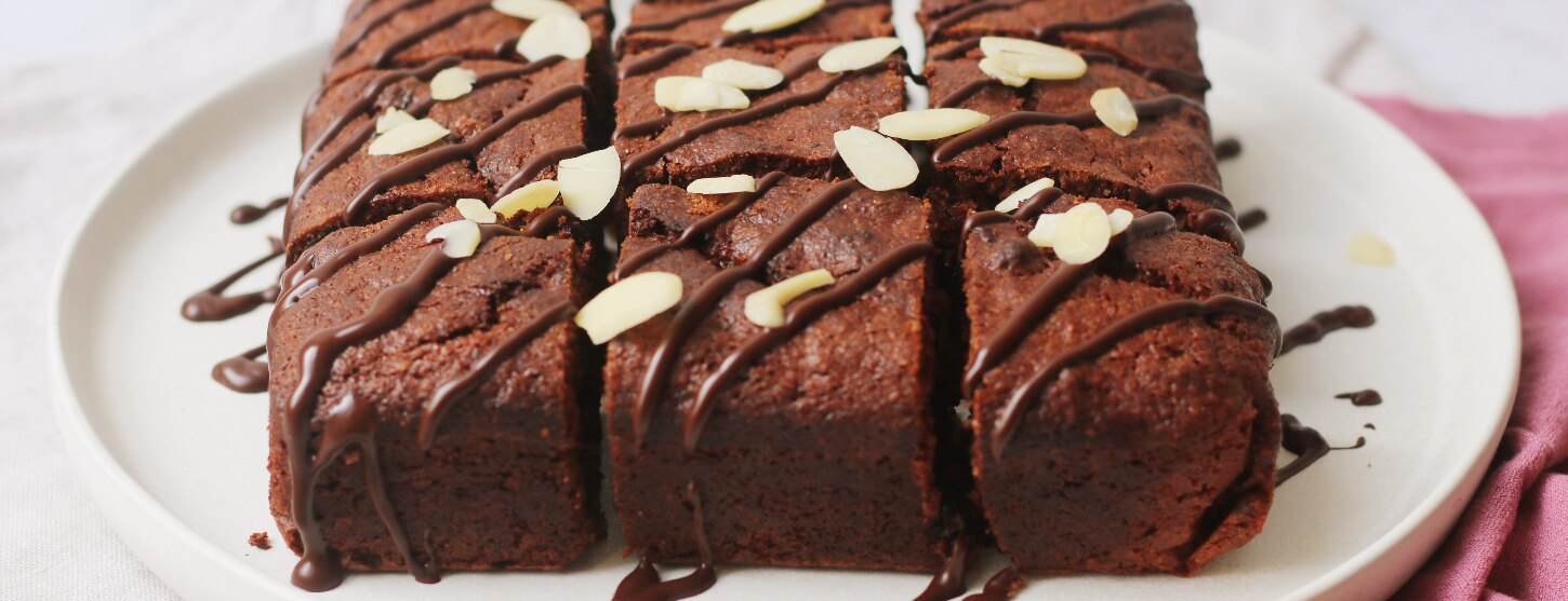 gluten free brownies with flaked almonds scattered on top