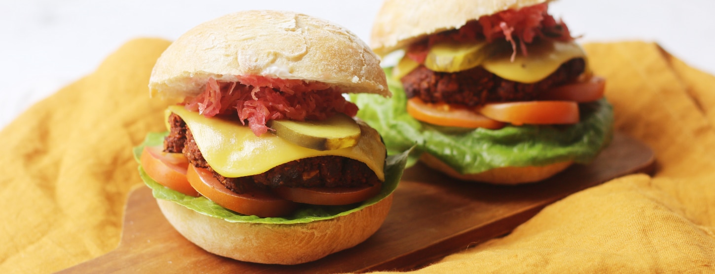 vegan plant-based burger with vegan cheese and beetroot sauerkraut