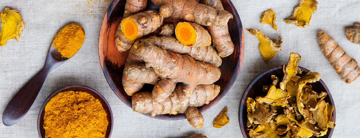 fresh grounded turmeric in a bowl
