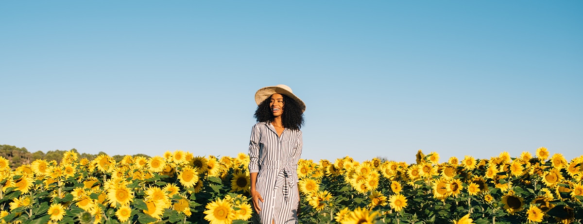 lady in a field of sunflowers