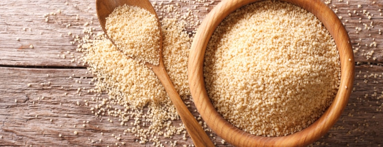 wooden bowl of raw couscous