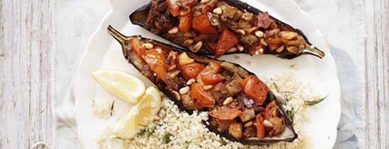A bowl of spiced stuffed aubergines with bulgur wheat and dill