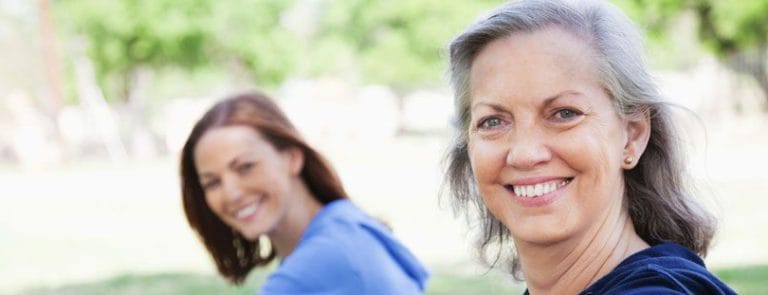 An Older Woman and A Younger Woman Smiling