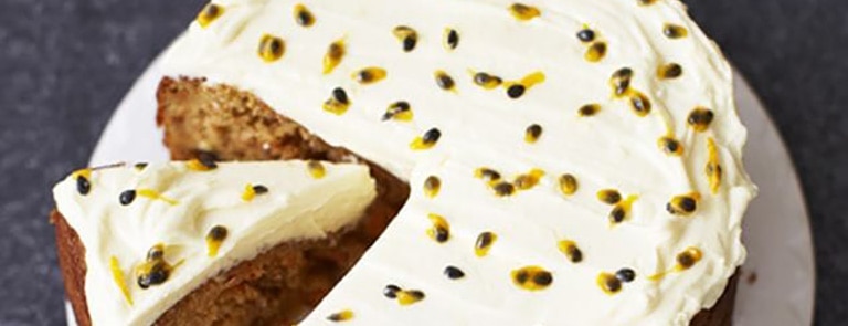 A glutten free carrot cake with passion fruit frosting