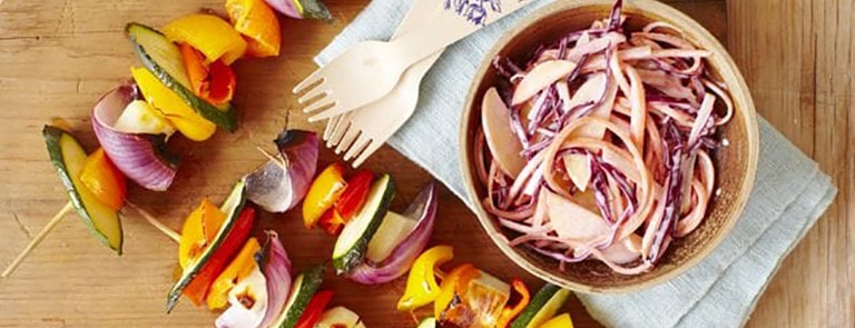 Halloumi and vegetable kebabs with fruit coleslaw image