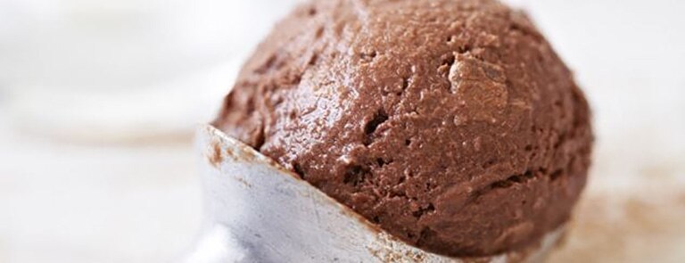 A scope of chocolate avocado ice cream