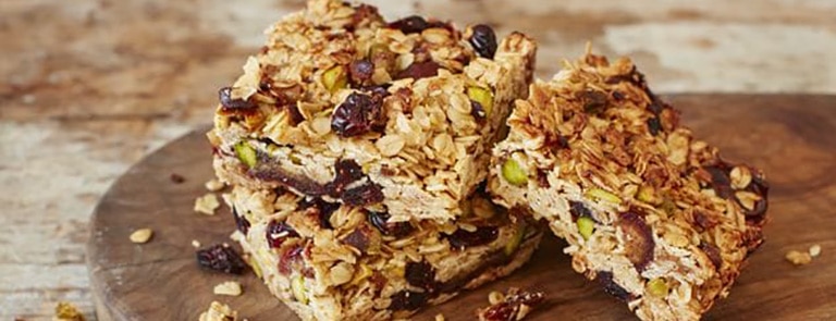 Slices of cranberry and pistachio flapjacks