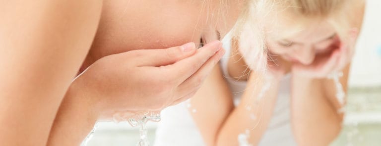 A women washing her face