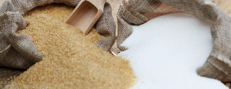 Bags of brown and white sugar