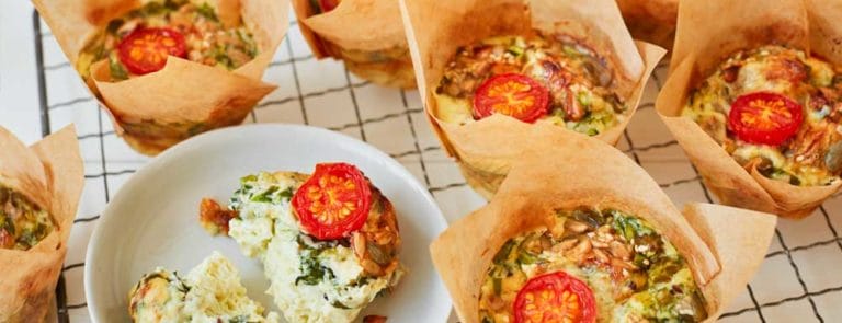 Spinach, asparagus and cherry tomato frittata muffins with mixed seeds
