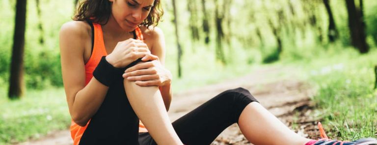Woman suffering from joint pain