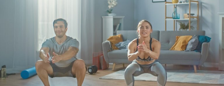 couple working out at home with no equipment