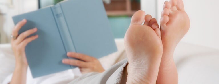 woman with feet up to improve circulation