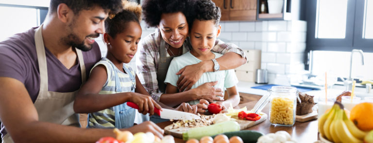 family cooking healthy foods together