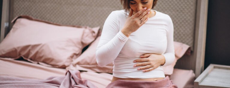 Pregnancy symptoms week by week: the first trimester image